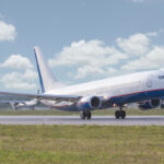 Commercial Airplane In Sky