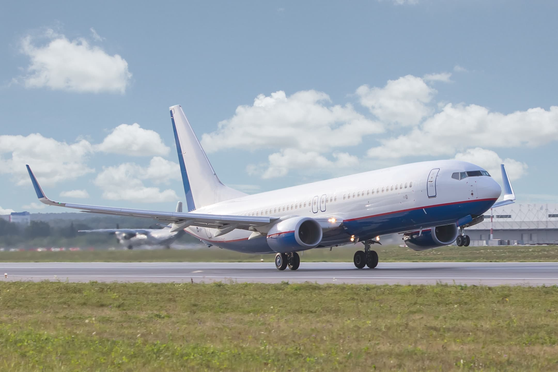 Commercial Airplane In Sky