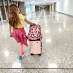 Teenager with backpack at airport