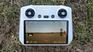 DJI RC Smart Controller on the ground to show the controls