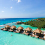 Renaissance Wind Creek Aruba Resort with flamingos on the private island, a popular tourist attraction