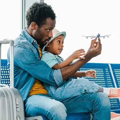 Dad and toddler in airport